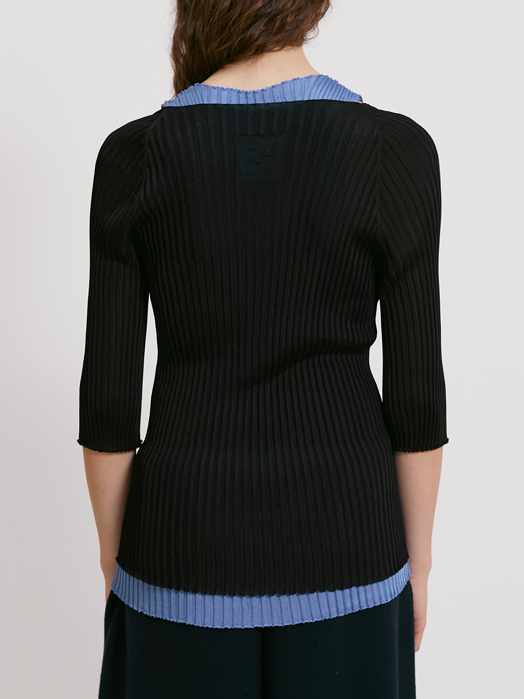 Viscose ribbed sweater with 3/4 sleeves and reversible necklines